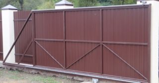 Купить откатные ворота из профнастила Улан-Удэ, цена от 1739 руб.